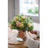 Centro de mesa con flor en jarrón