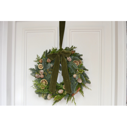 Corona de puerta lazada terciopelo verde