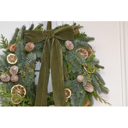 Corona de puerta lazada terciopelo verde