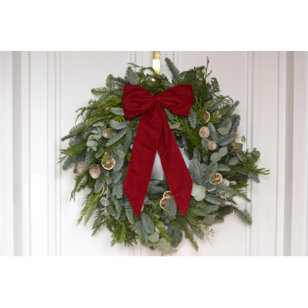 Corona de puerta lazada roja verdes variados