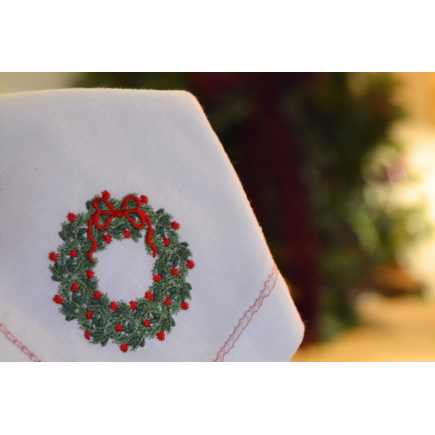 Servilleta bordada corona navidad